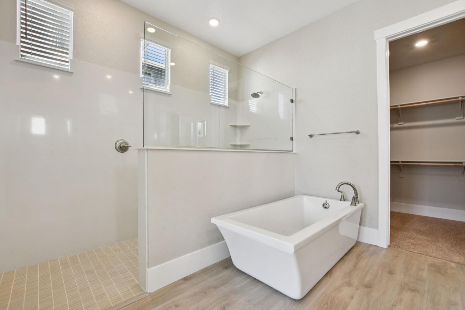 3016 Pocosol Way Rancho Cordova, CA 95742 - Photo 30 of 37 a white bath tub sitting in a bathroom