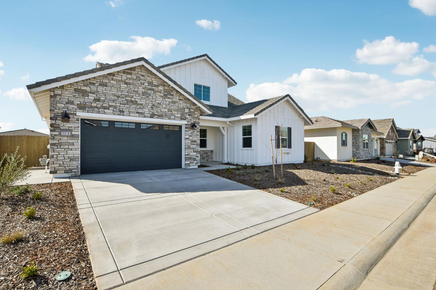 3016 Pocosol Way Rancho Cordova, CA 95742 - Photo 4 of 37 a front view of a house with yard