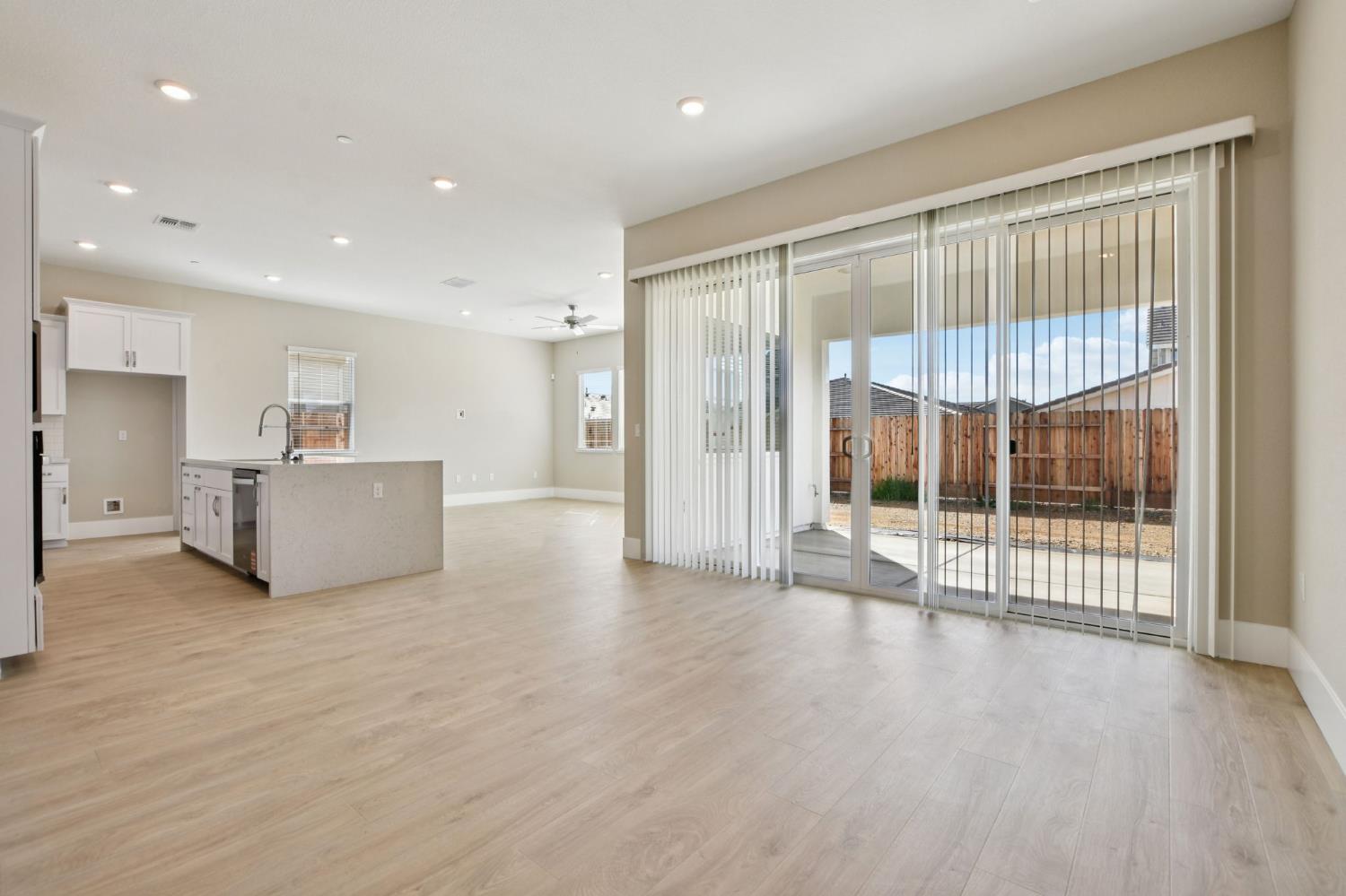 3016 Pocosol Way Rancho Cordova, CA 95742 - Photo 6 of 37 a view of a big room with wooden floor and windows