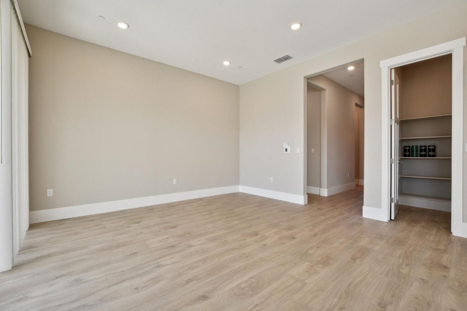 3016 Pocosol Way Rancho Cordova, CA 95742 - Photo 7 of 37 a view of an empty room with a kitchen