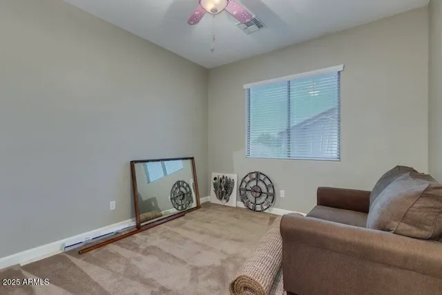 a livingroom with furniture and a window