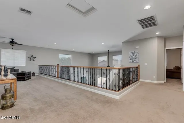 a view of a hallway with workspace