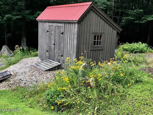 469 Boulger Road Stamford, VT 05352 - Photo 26 of 37 a backyard of a house with lots of green space