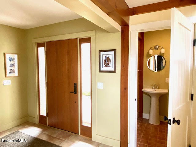 469 Boulger Road Stamford, VT 05352 - Photo 7 of 37 a view of a bathroom with a door