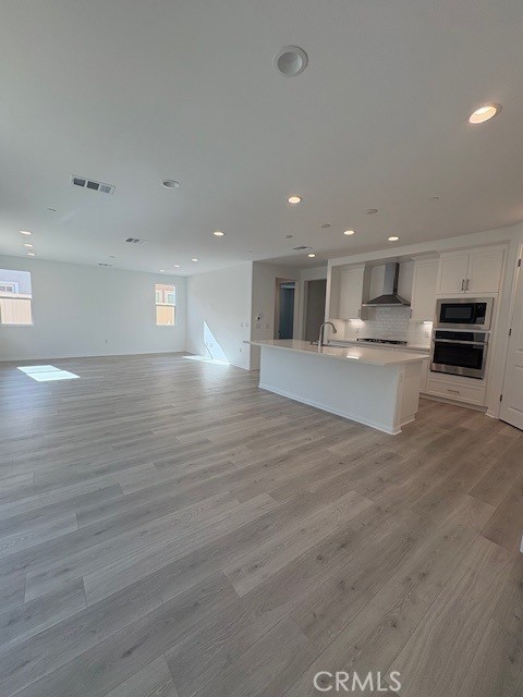 30495 Servin Lane Menifee, CA 92584 - Photo 11 of 22 a view of a kitchen electric appliances and cabinets