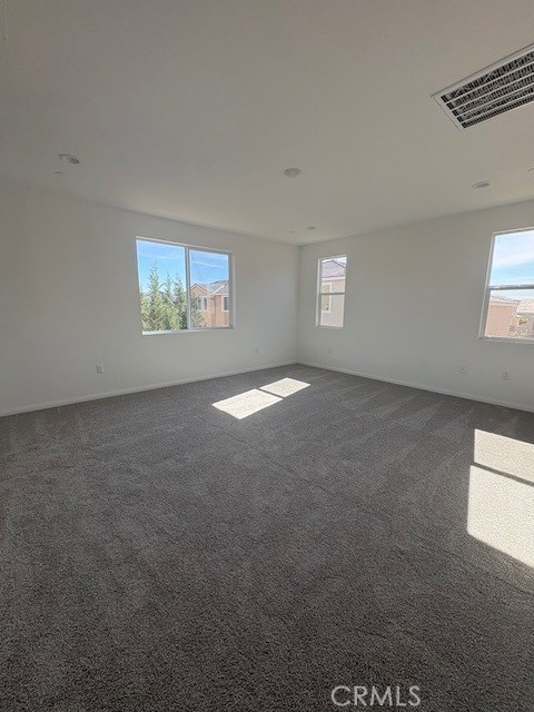 30495 Servin Lane Menifee, CA 92584 - Photo 20 of 22 a view of an empty room with a window