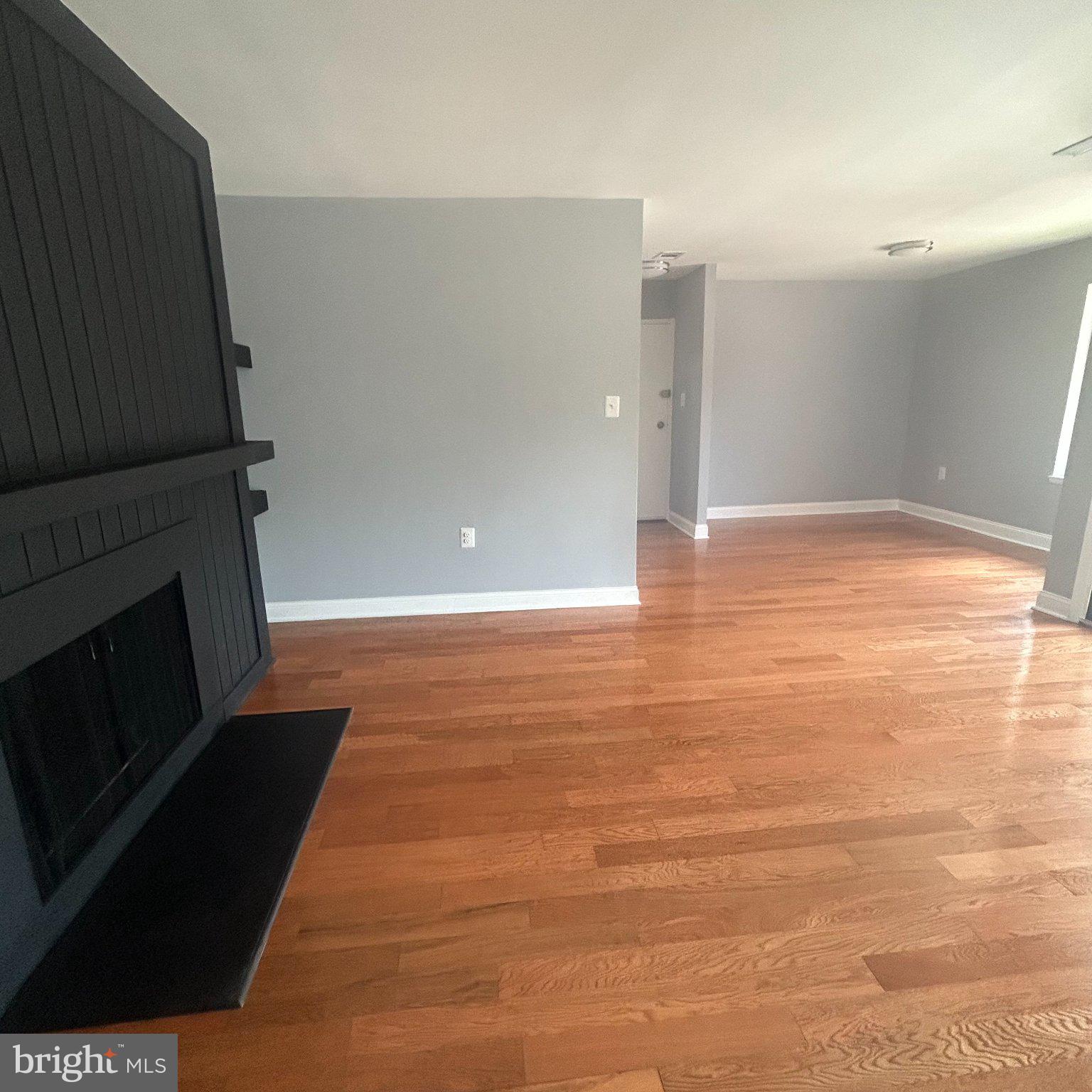 10549 Twin Rivers Road, Unit E1 Columbia, MD 21044 - Photo 7 of 20 Spacious living area with modern charm.