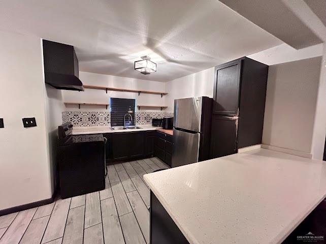 21325 Norene Drive Edcouch, TX 78538 - Photo 7 of 15 a kitchen with kitchen island stainless steel appliances a sink cabinets and a counter top space