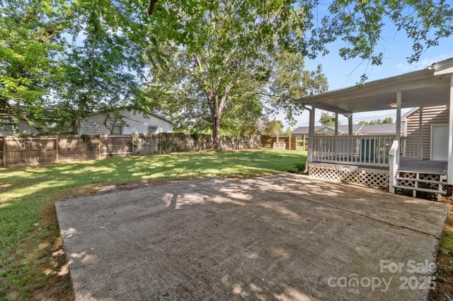 a view of a yard with an outdoor space