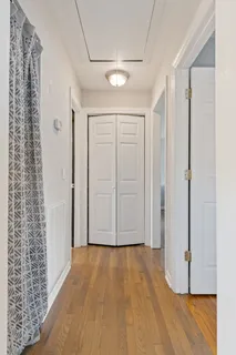 a view of entryway with wooden floor