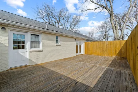 a view of a backyard of the house