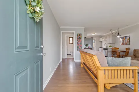 a view of a living room and dining room