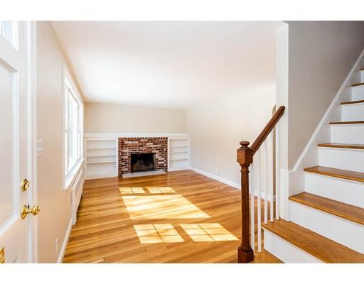 7 Roosevelt Road Lexington, MA 02421 - Photo 3 of 28 a view of an entryway with wooden floor