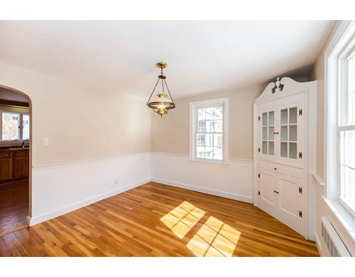 7 Roosevelt Road Lexington, MA 02421 - Photo 6 of 28 a view of empty room with wooden floor and fan