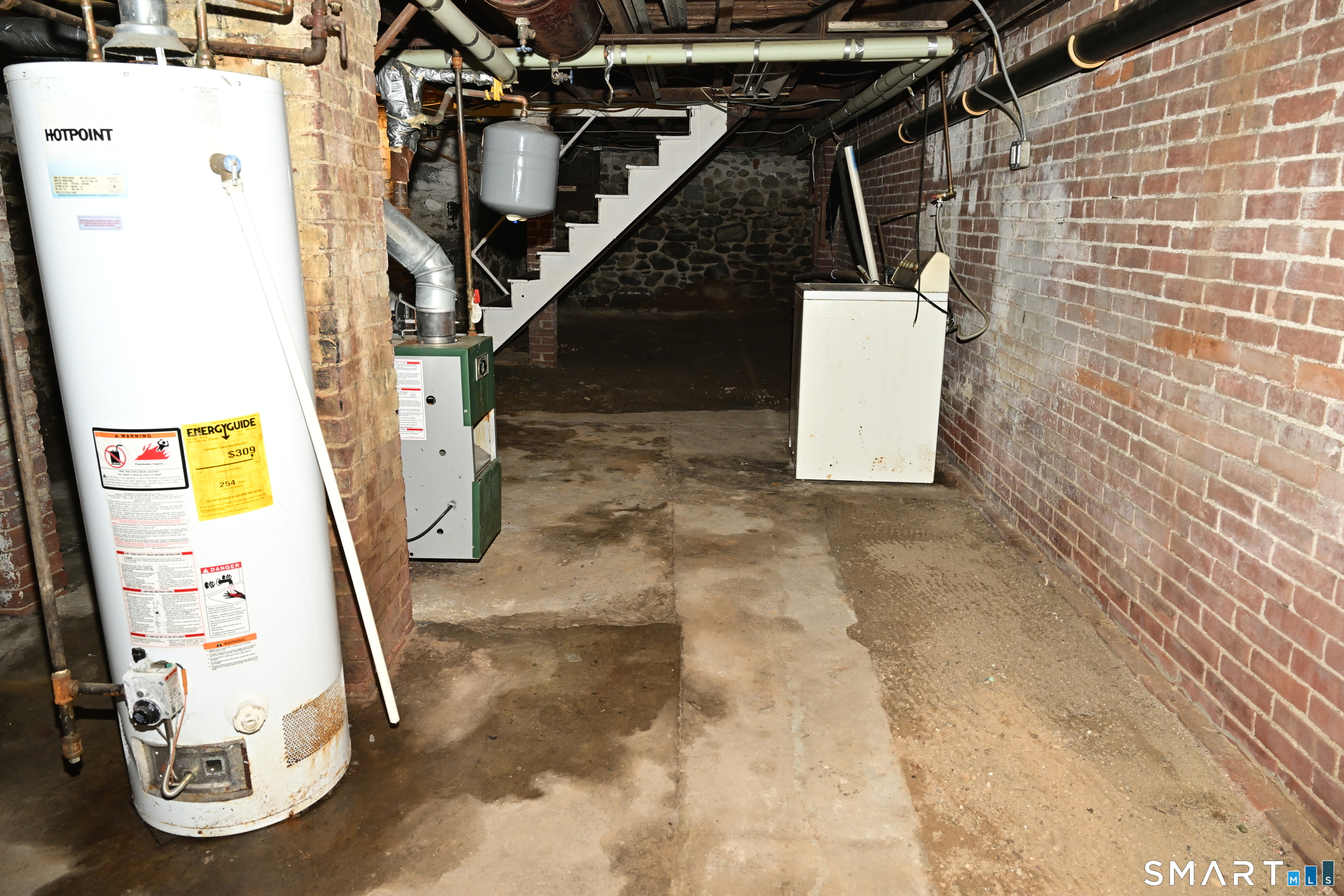 29 Locke Street Ansonia, CT 06401 - Photo 21 of 39 Right Side basement