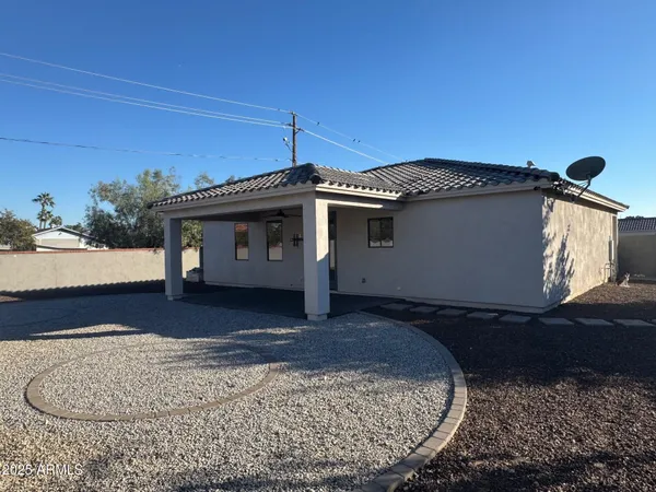 a view of a house with a patio
