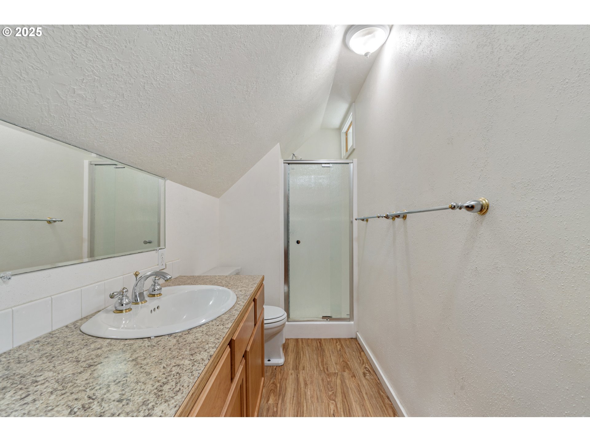 1307 3rd Street Tillamook, OR 97141 - Photo 27 of 42 a bathroom with a sink and a mirror
