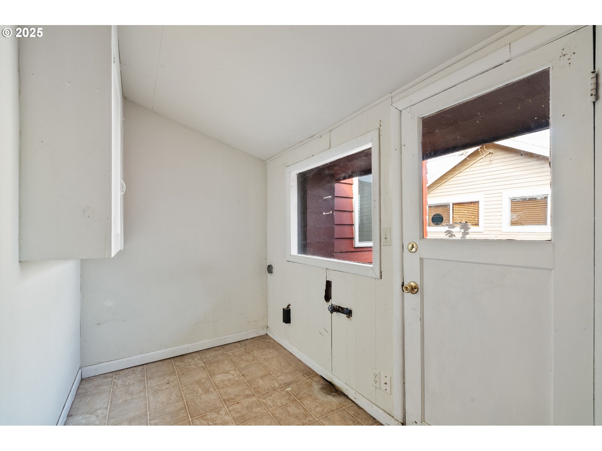 1307 3rd Street Tillamook, OR 97141 - Photo 35 of 42 a view of an entryway with wooden floor