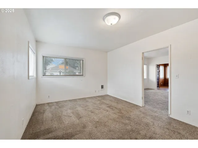 a view of an empty room with window