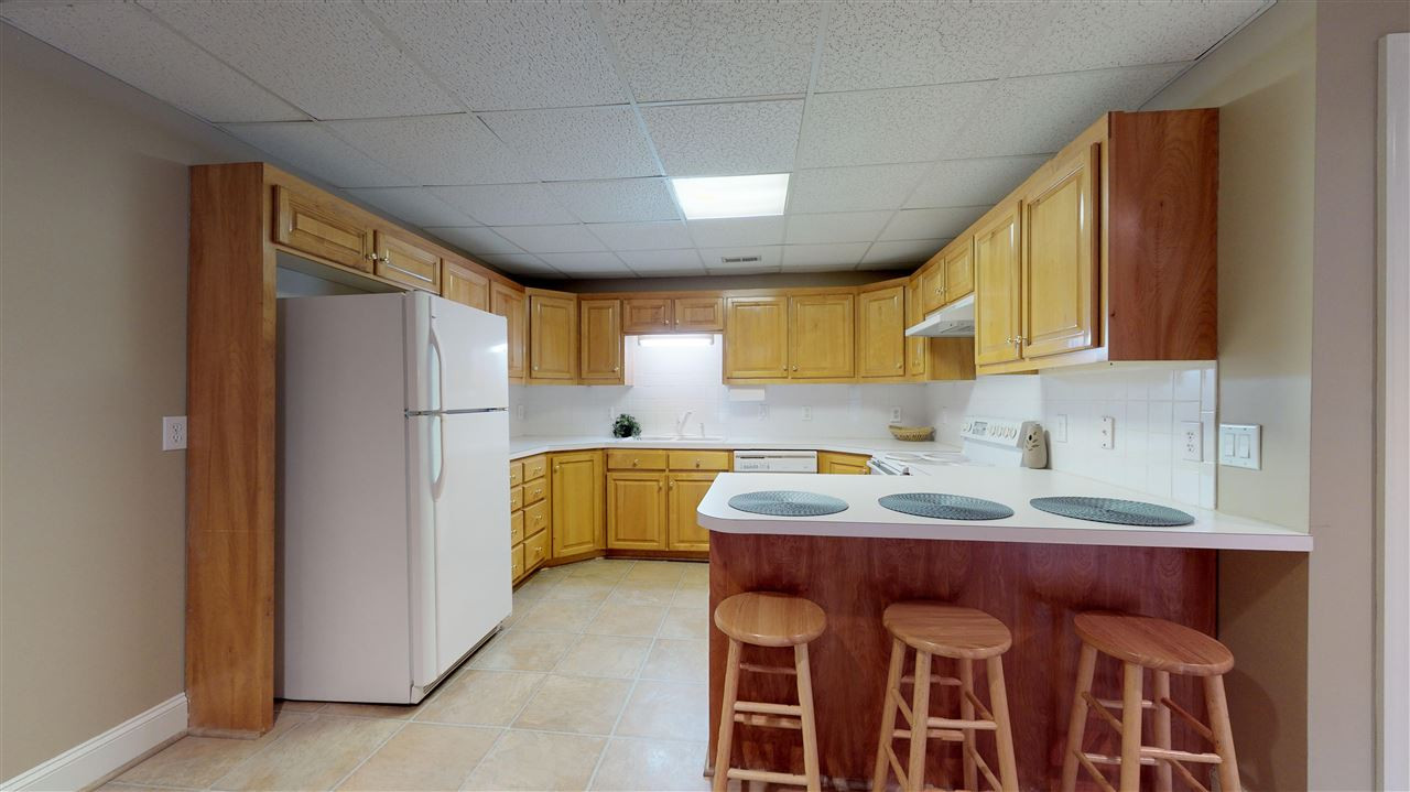 13609 Possum Track Road Raleigh, NC 27614 - Photo 23 of 30 Lower level kitchen