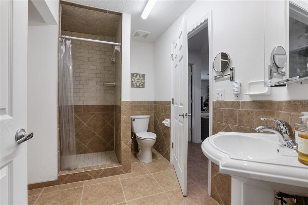 420 Glenwood Road DeLand, FL 32720 - Photo 12 of 36 a bathroom with a sink and toilet