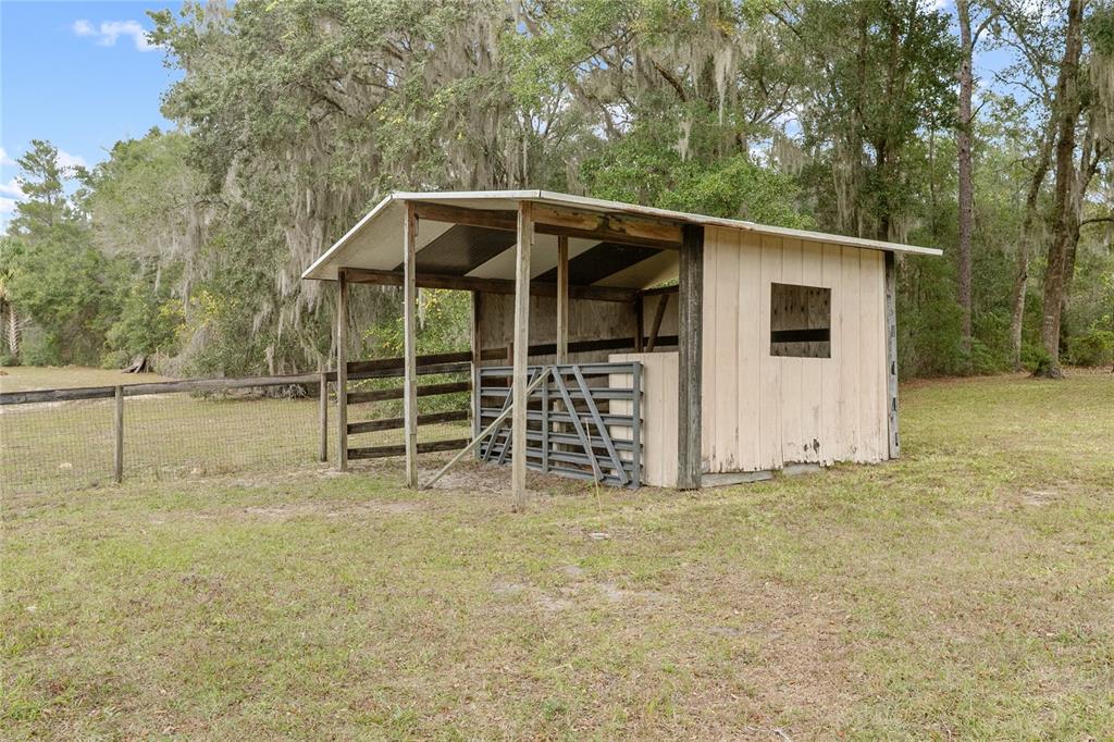 420 Glenwood Road DeLand, FL 32720 - Photo 29 of 36 a view of a house with a yard
