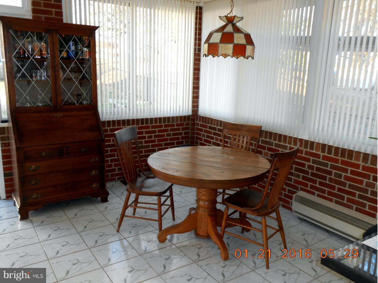 362 Stillwater Road Baltimore, MD 21221 - Photo 9 of 19 Bright and Large Sunroom Picture 1