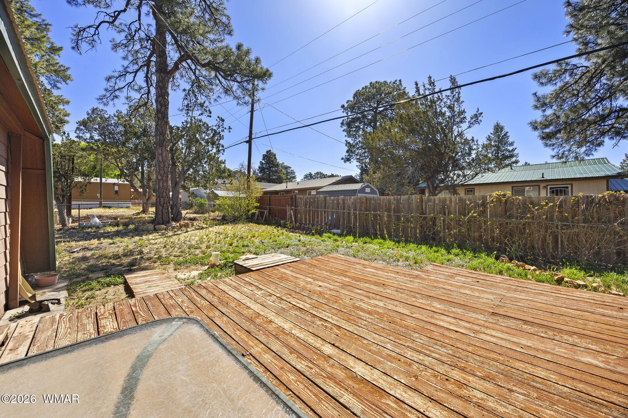 3355 Rim Lakes Drive Overgaard, AZ 85933 - Photo 20 of 37 a view of a backyard with wooden fence