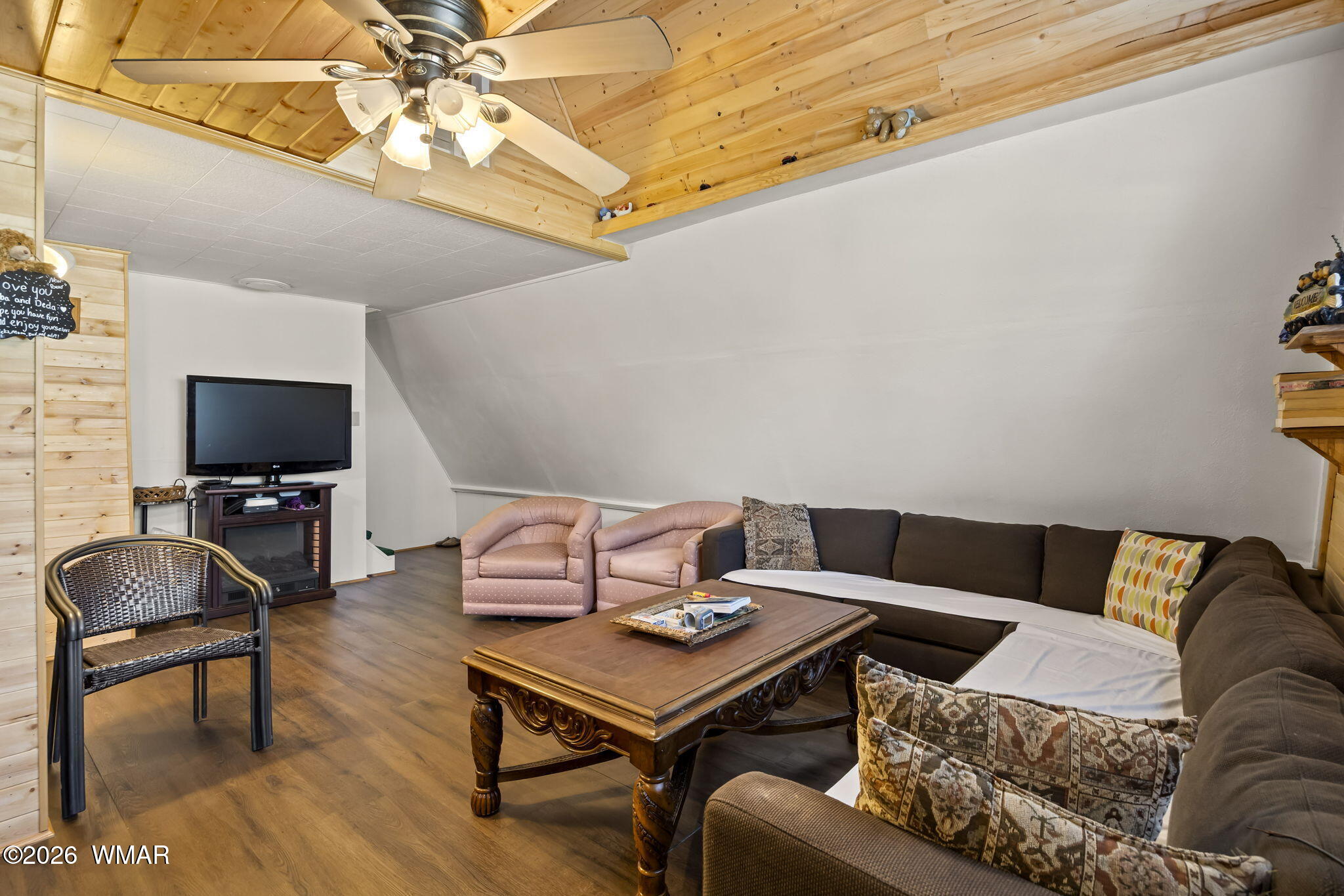 3355 Rim Lakes Drive Overgaard, AZ 85933 - Photo 6 of 37 a living room with furniture and a flat screen tv