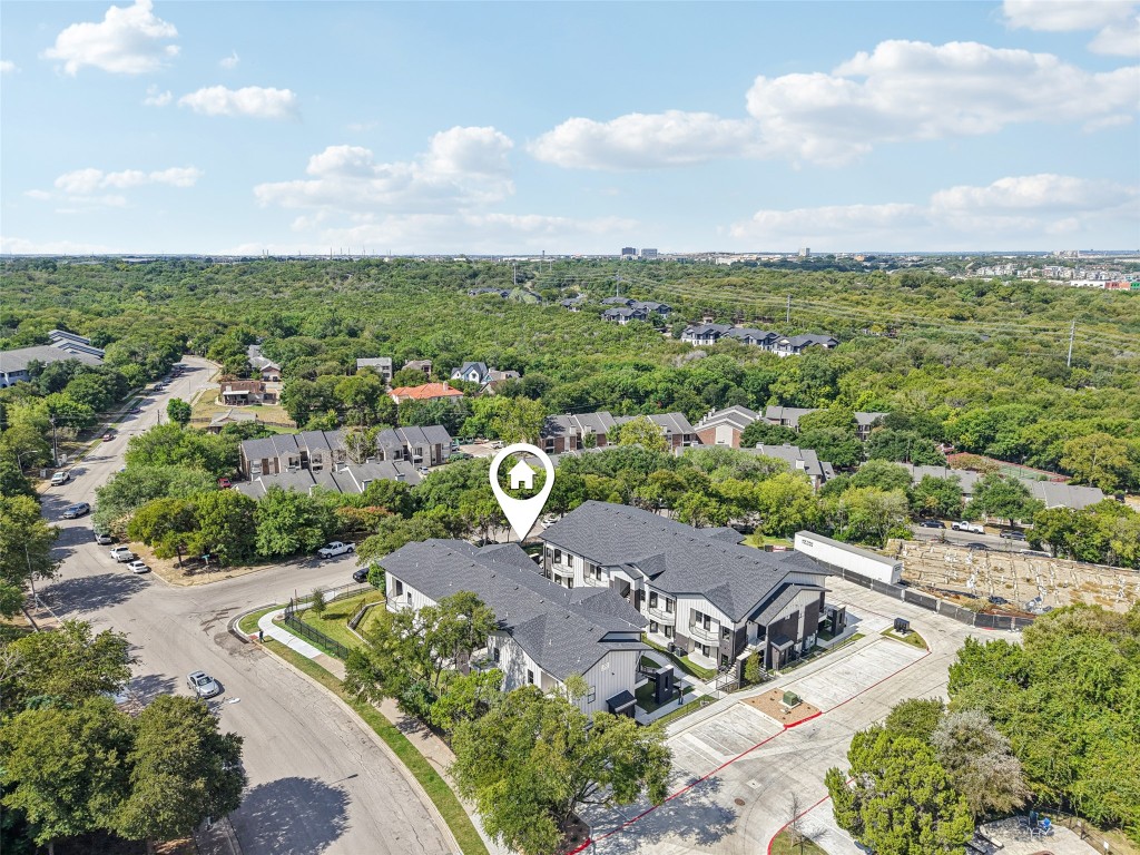 2450 Wickersham Lane, Unit 2011 Austin, TX 78741 - Photo 31 of 31 an aerial view of a house with a garden