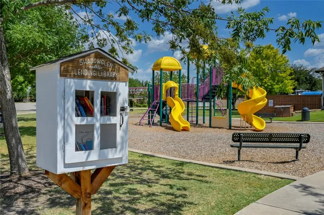 an aerial view of a house with swimming pool
