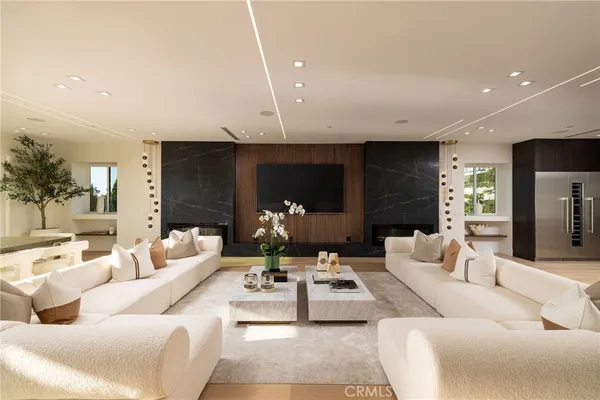 a room with furniture and a large window