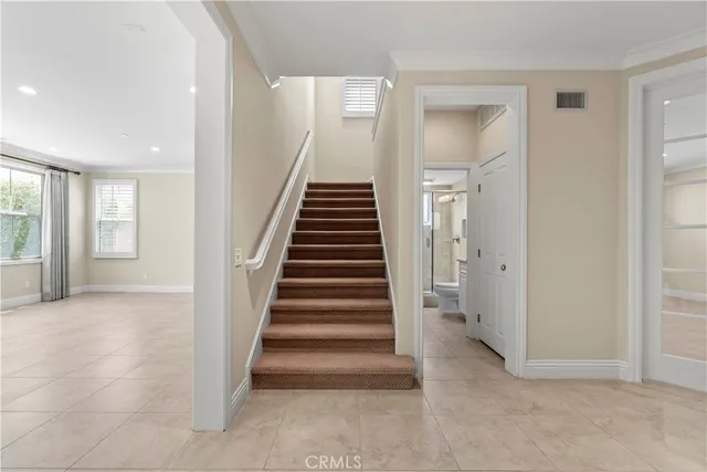 a view of an entryway with stairs