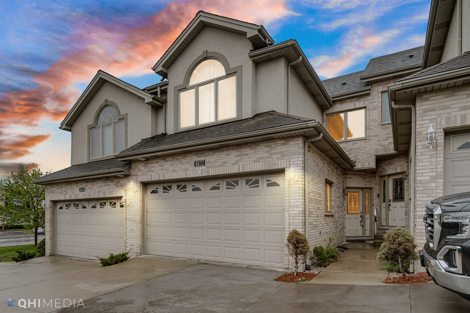 8832 South Roberts Road Hickory Hills, IL 60457 - Photo 1 of 16 a front view of a house with a garage