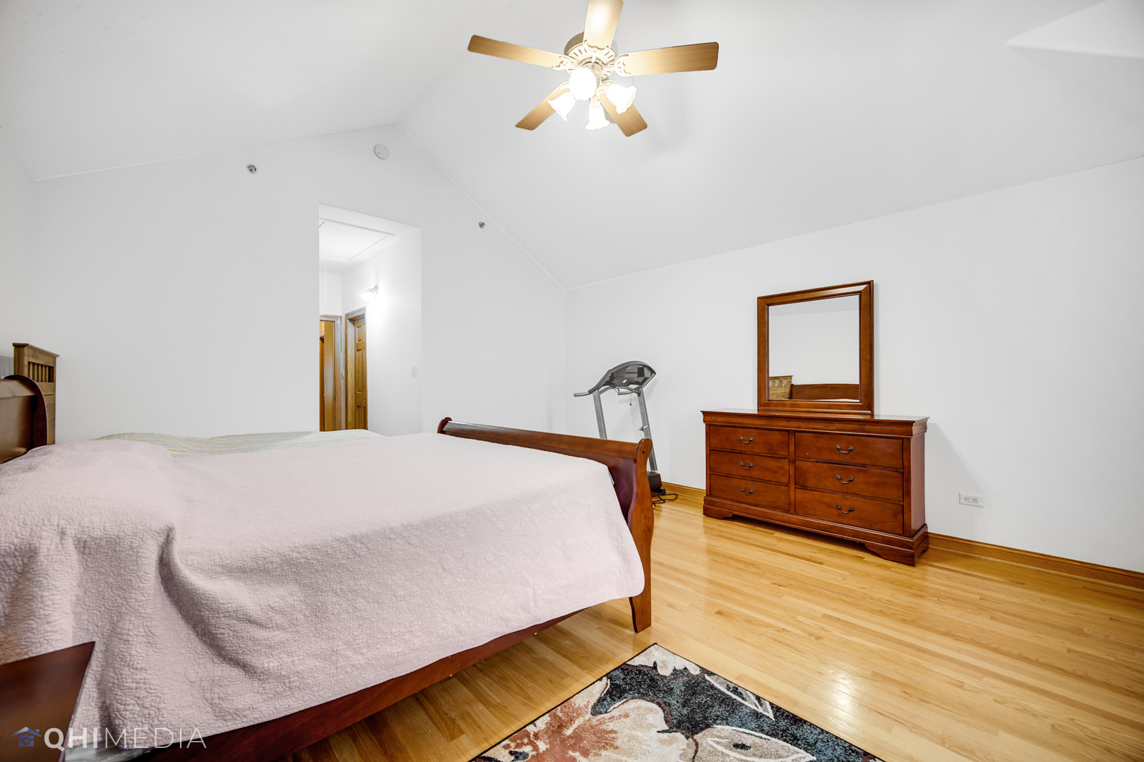 8832 South Roberts Road Hickory Hills, IL 60457 - Photo 12 of 16 a bedroom with bed and wooden floor