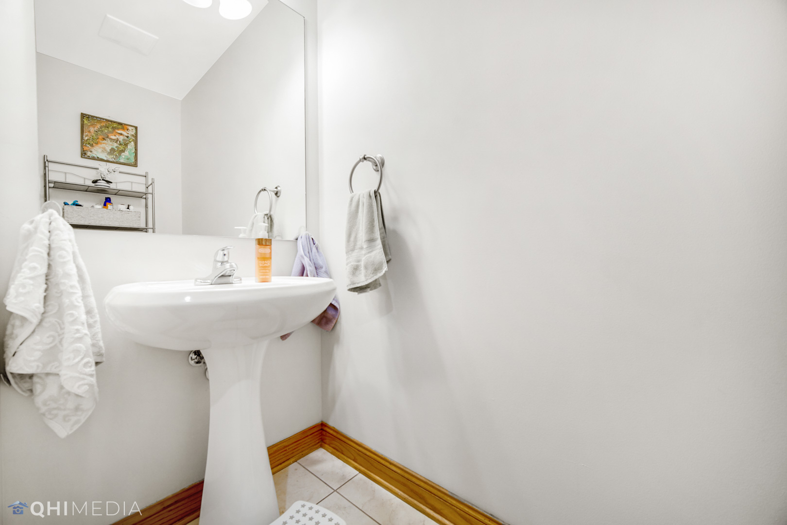8832 South Roberts Road Hickory Hills, IL 60457 - Photo 13 of 16 a bathroom with a sink and a mirror