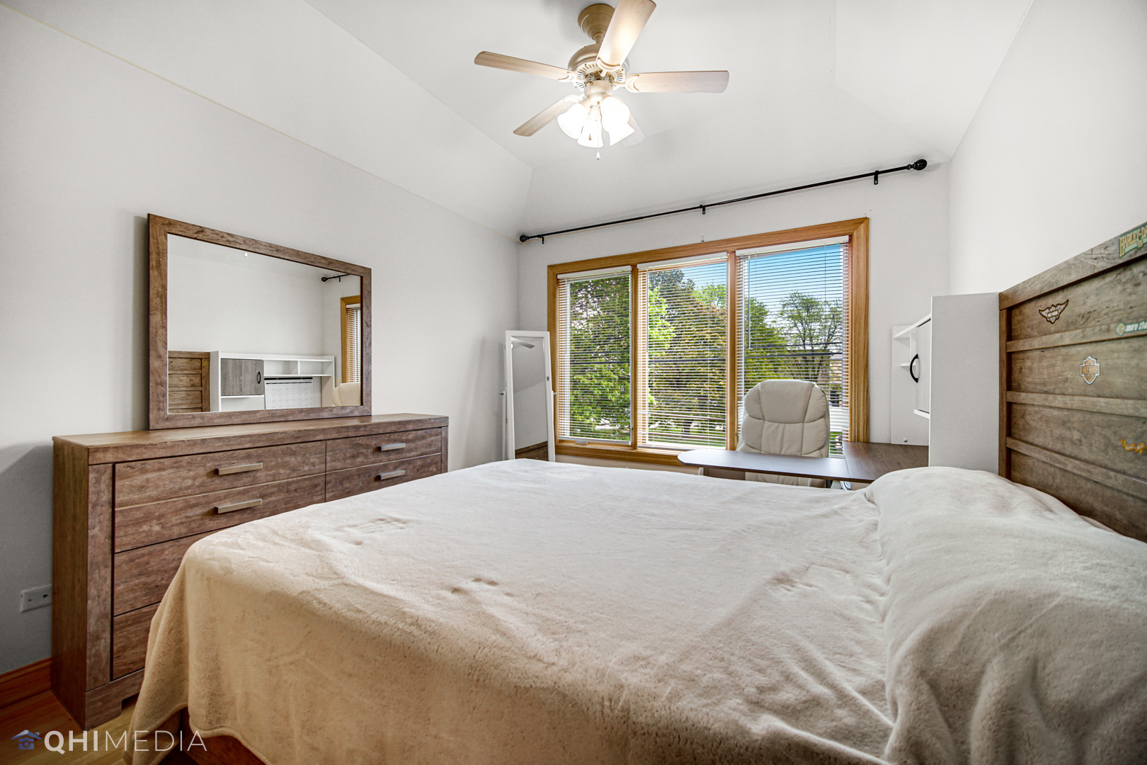 8832 South Roberts Road Hickory Hills, IL 60457 - Photo 10 of 16 a bedroom with a large bed and a large window