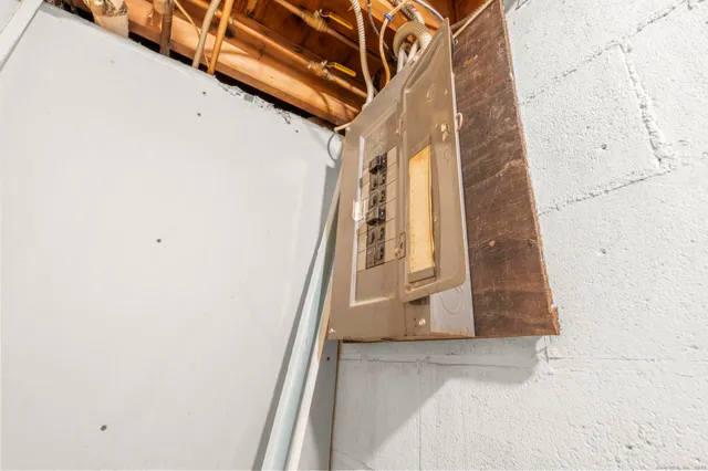 a view of staircase with white walls