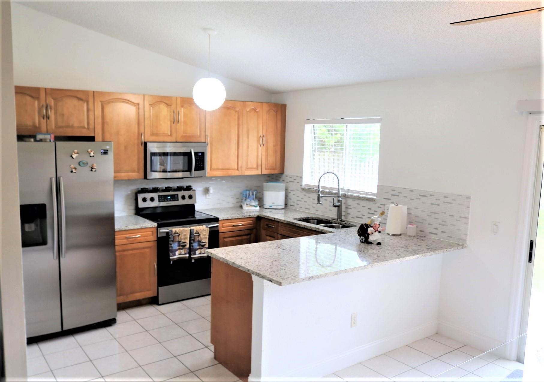 4901 Northwest Ever Road Port St. Lucie, FL 34983 - Photo 3 of 24 KITCHEN