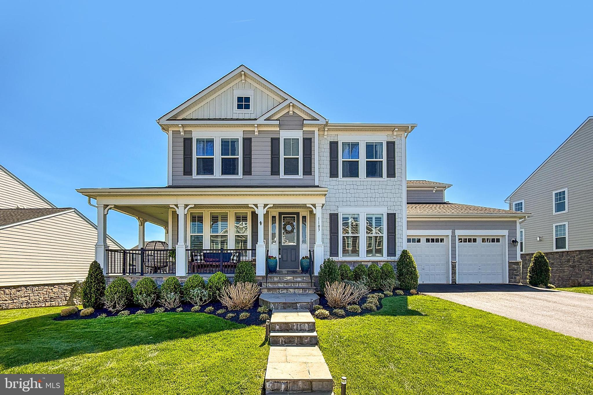 1103 Themis Street Southeast Leesburg, VA 20175 - Photo 1 of 108 a front view of a house with a yard and garage
