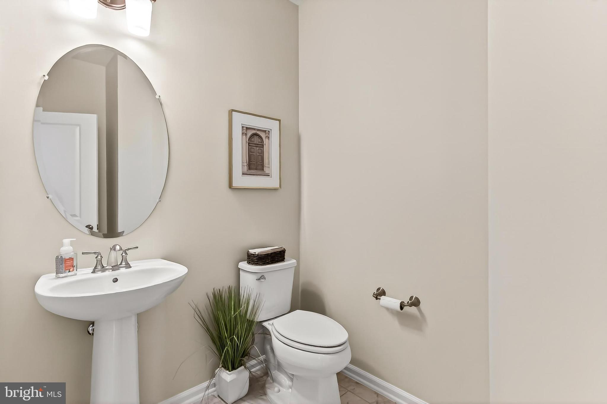 1103 Themis Street Southeast Leesburg, VA 20175 - Photo 18 of 108 Sleek modern 1/2-bath on main lvl adds convenience
