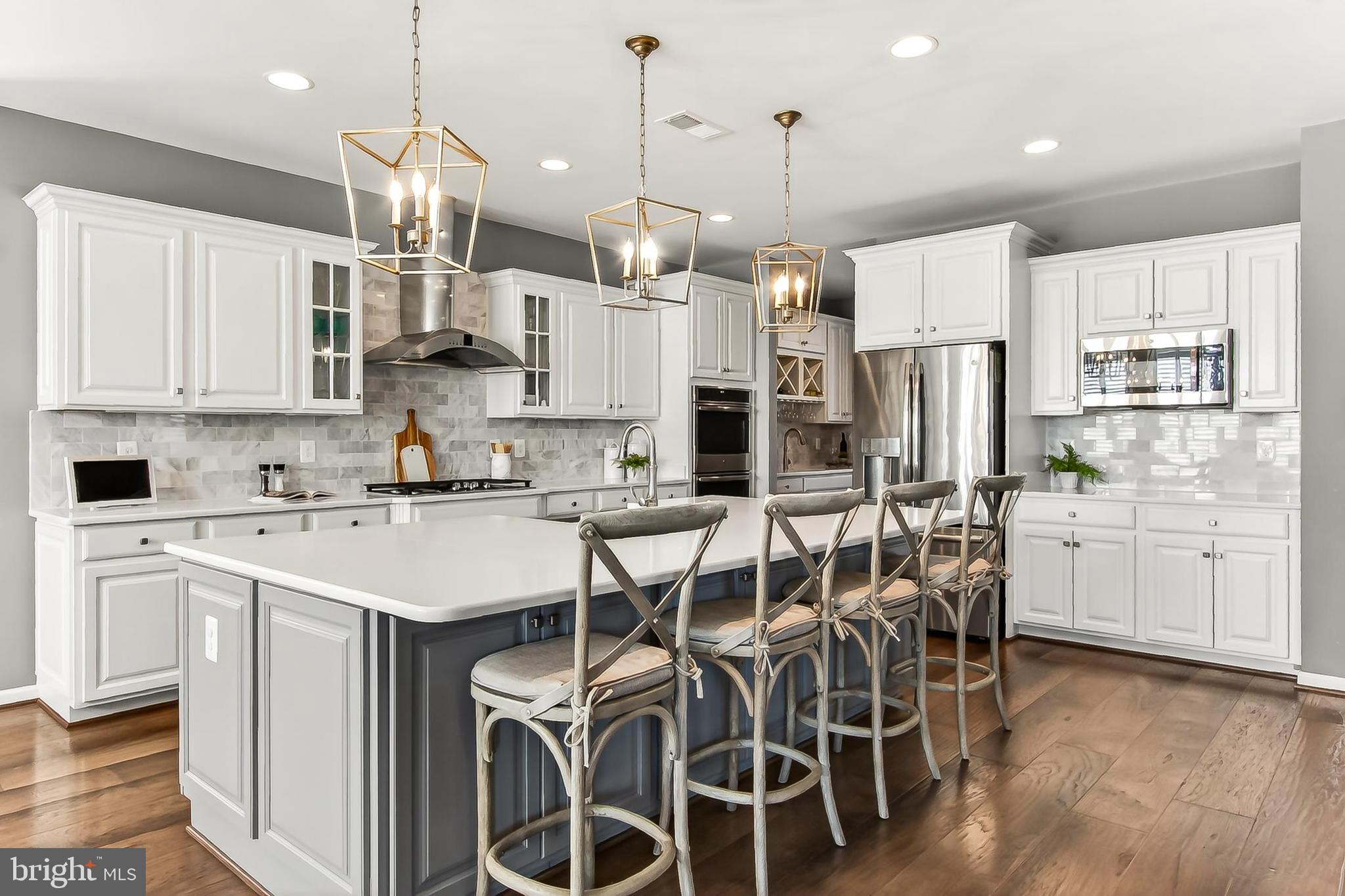 1103 Themis Street Southeast Leesburg, VA 20175 - Photo 22 of 108 Huge 12-foot island easily has seating for 4
