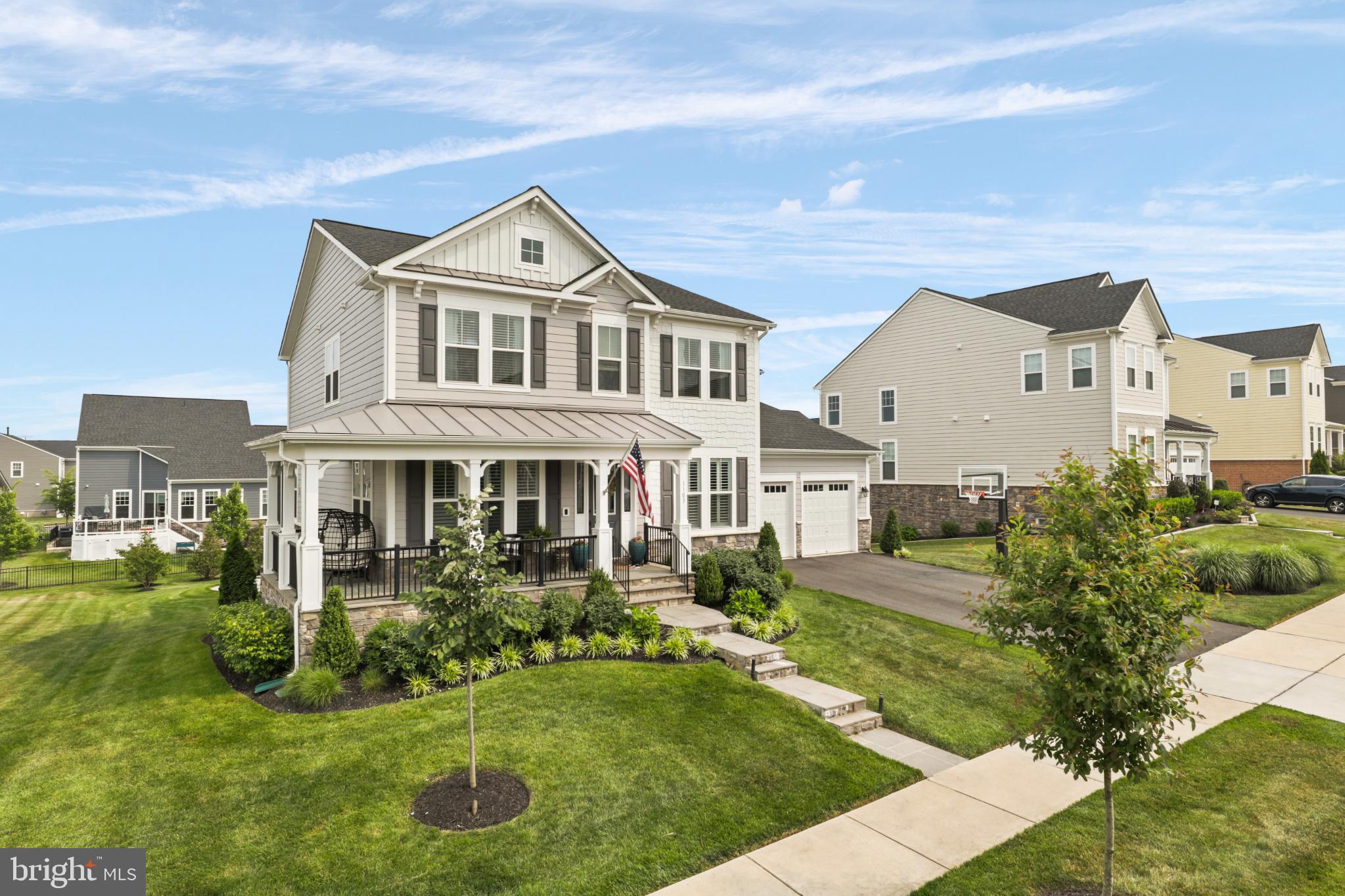 1103 Themis Street Southeast Leesburg, VA 20175 - Photo 3 of 108 Lush lawn and double driveway w/basketball goal