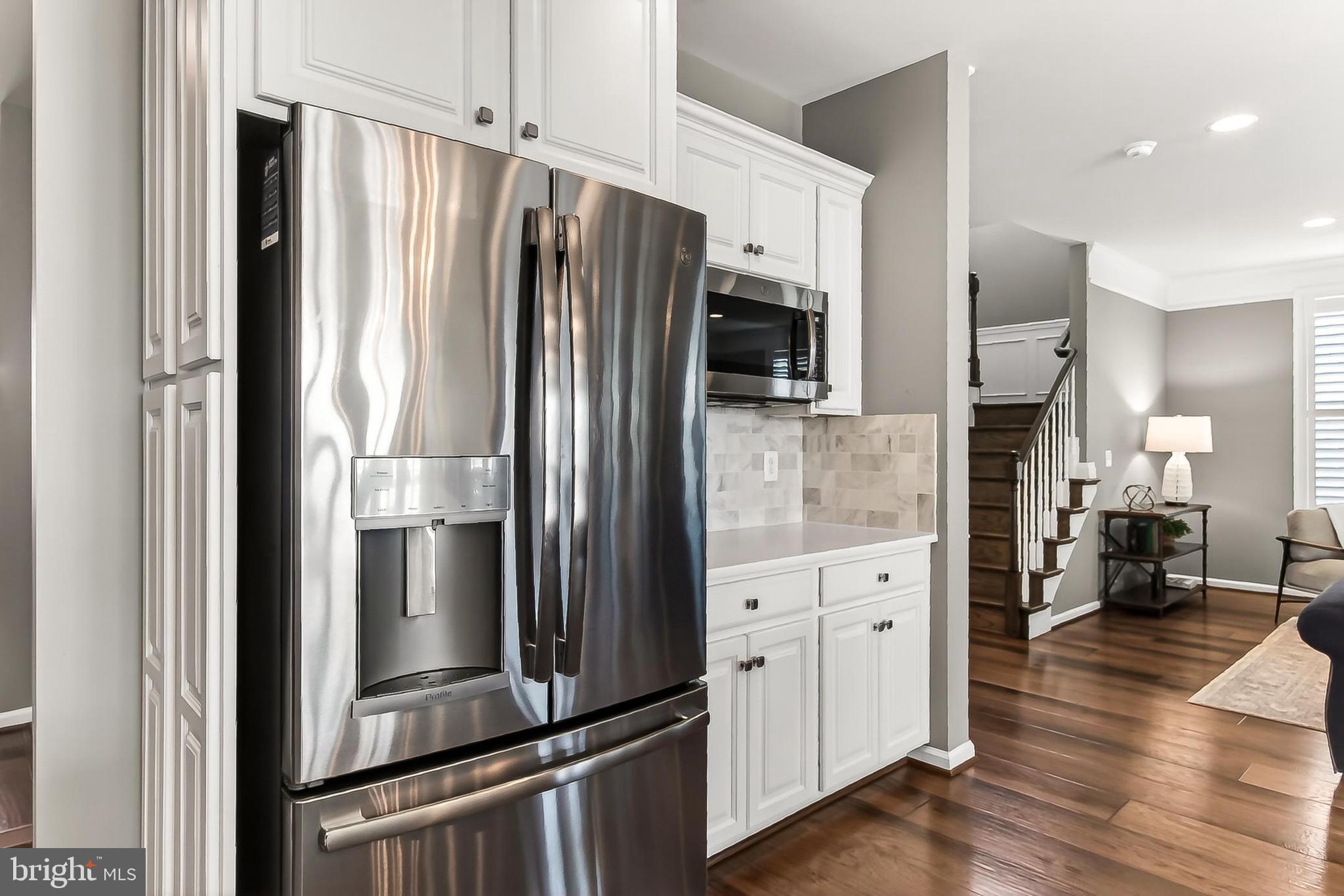 1103 Themis Street Southeast Leesburg, VA 20175 - Photo 33 of 108 French door refrigerator and built-in microwave