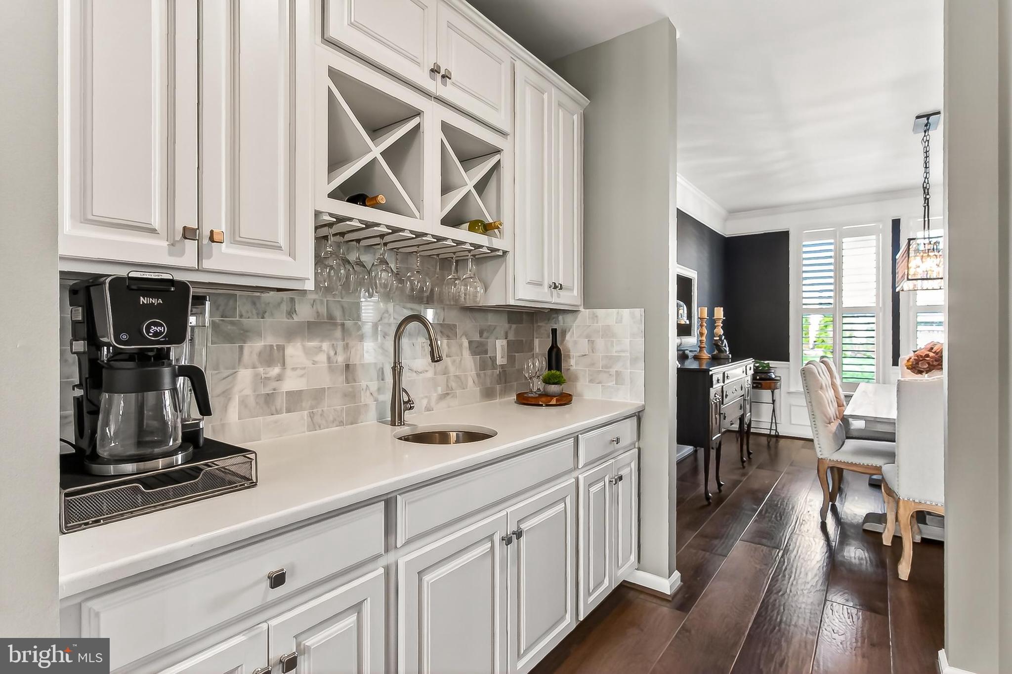 1103 Themis Street Southeast Leesburg, VA 20175 - Photo 35 of 108 Ceramic tile backsplash & wine rack