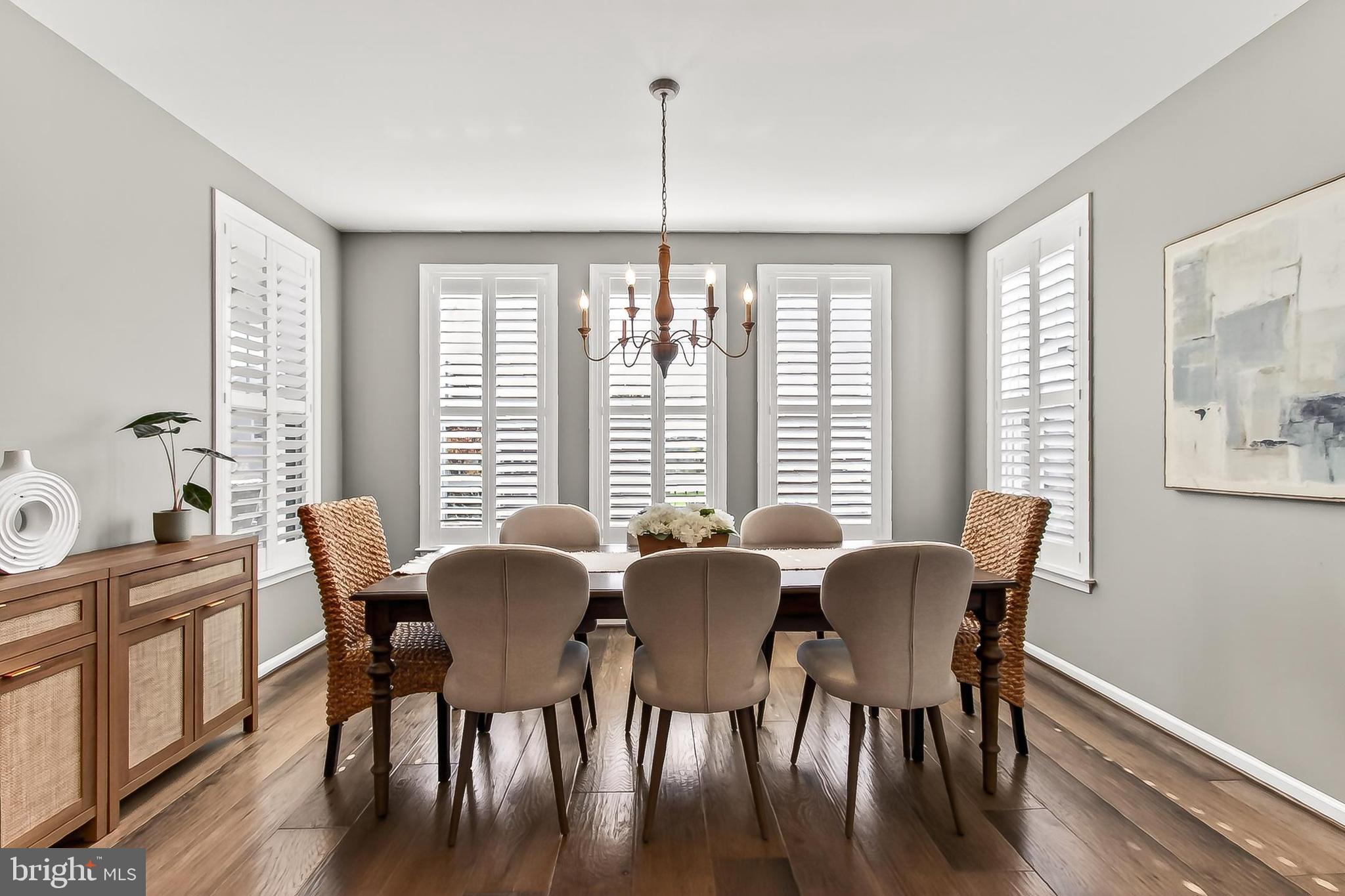 1103 Themis Street Southeast Leesburg, VA 20175 - Photo 38 of 108 a view of a dining room with furniture windows and wooden floor