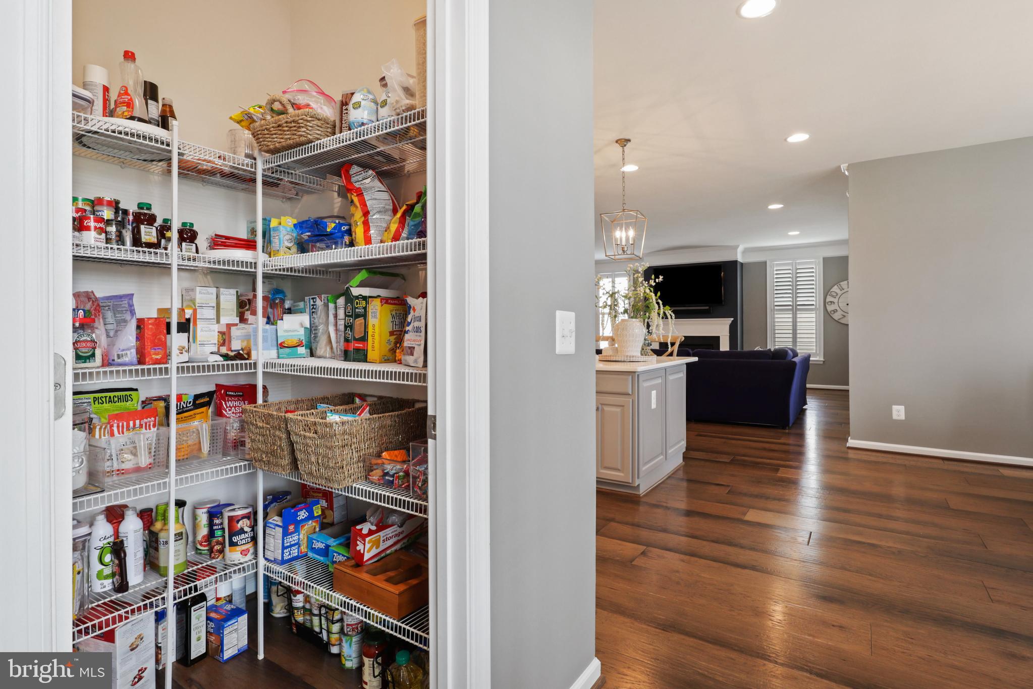 1103 Themis Street Southeast Leesburg, VA 20175 - Photo 40 of 108 a view of a kitchen with fridge and an empty room