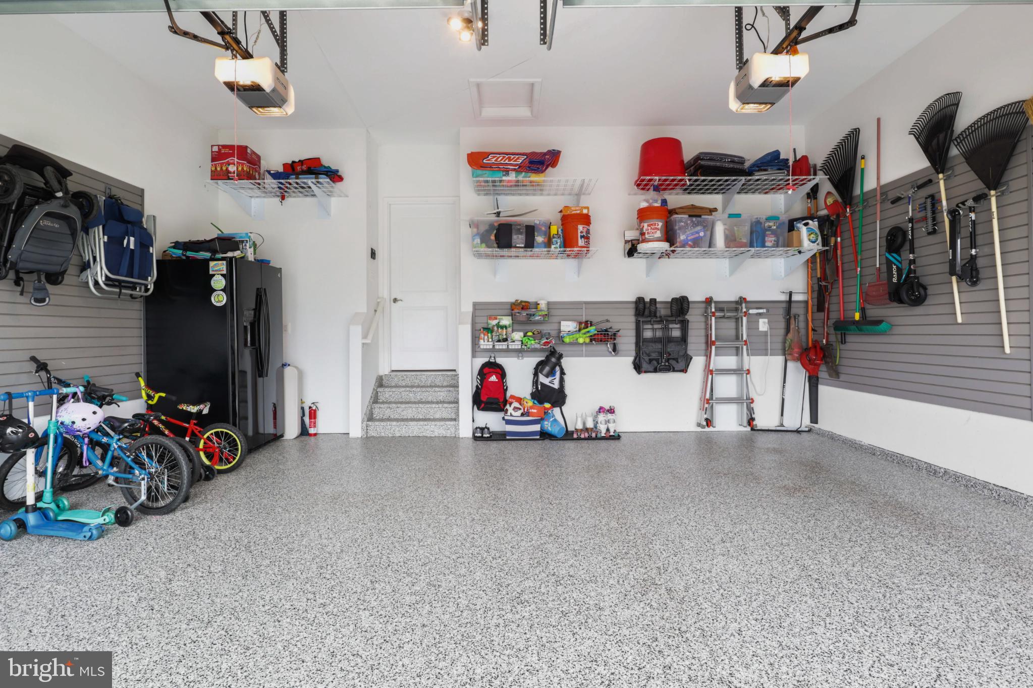 1103 Themis Street Southeast Leesburg, VA 20175 - Photo 49 of 108 Organized garage w/floor paint & ample storage