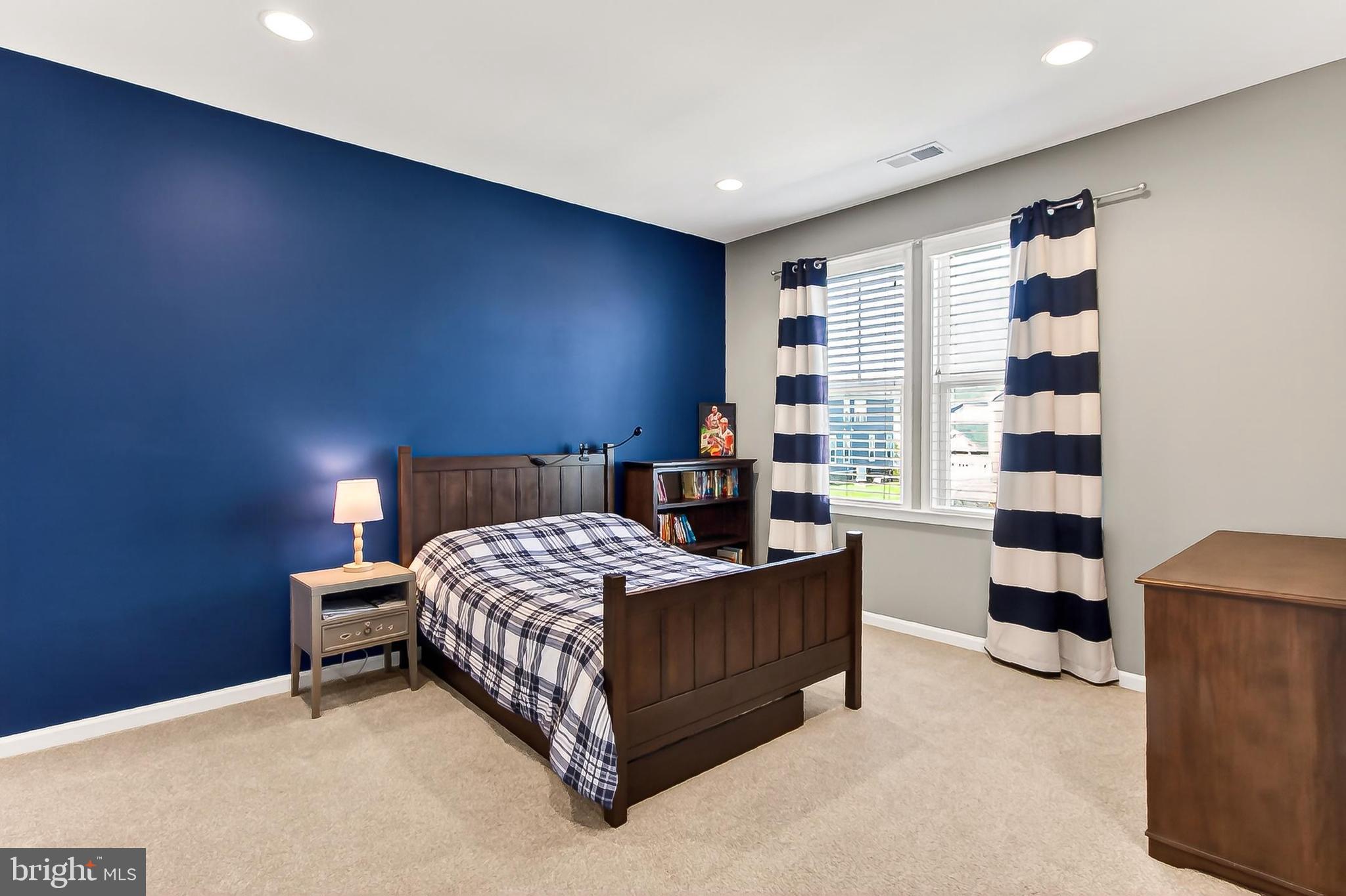 1103 Themis Street Southeast Leesburg, VA 20175 - Photo 63 of 108 Bedroom with bold navy accents.