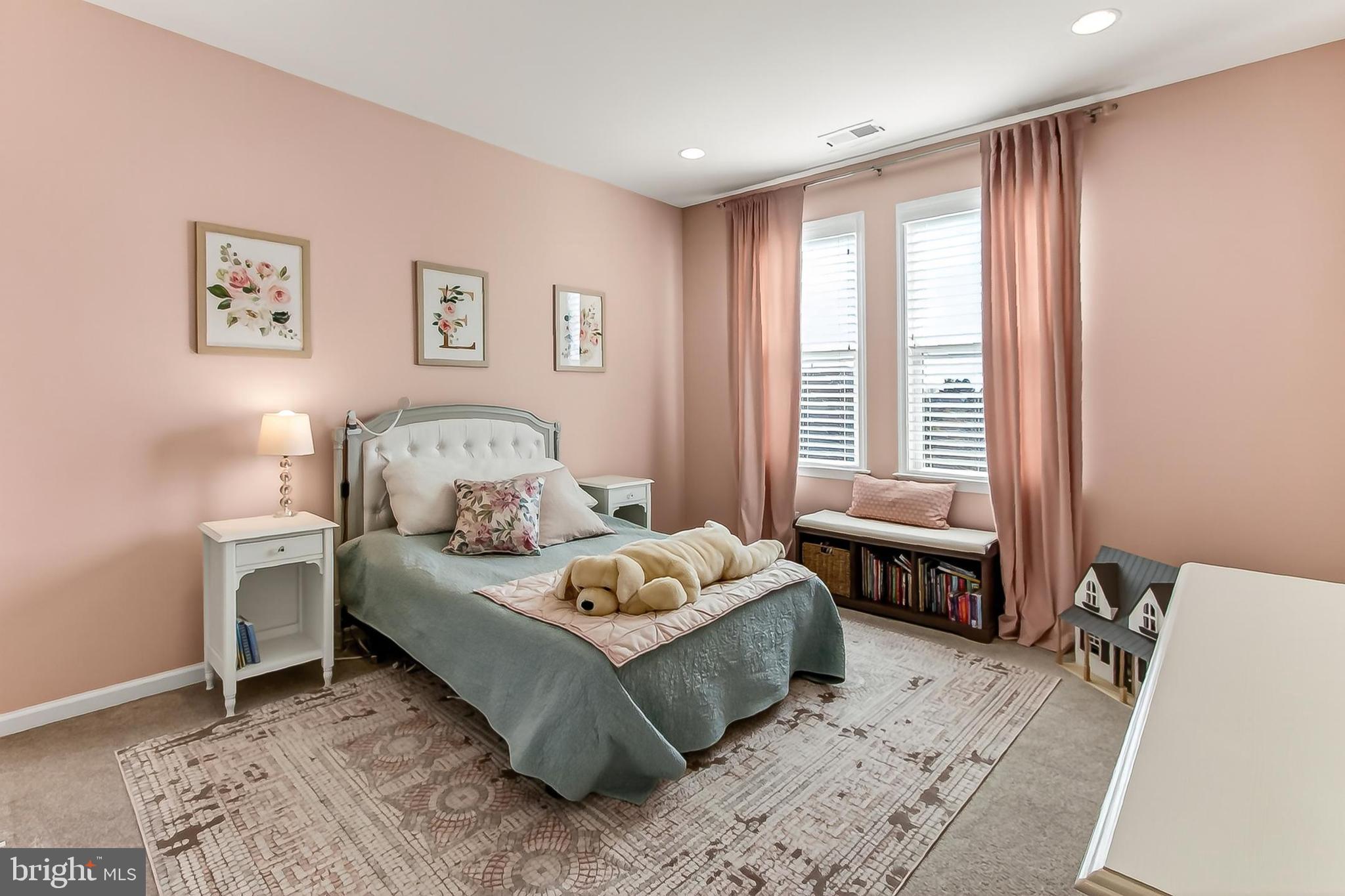 1103 Themis Street Southeast Leesburg, VA 20175 - Photo 69 of 108 a bedroom with a bed and a window